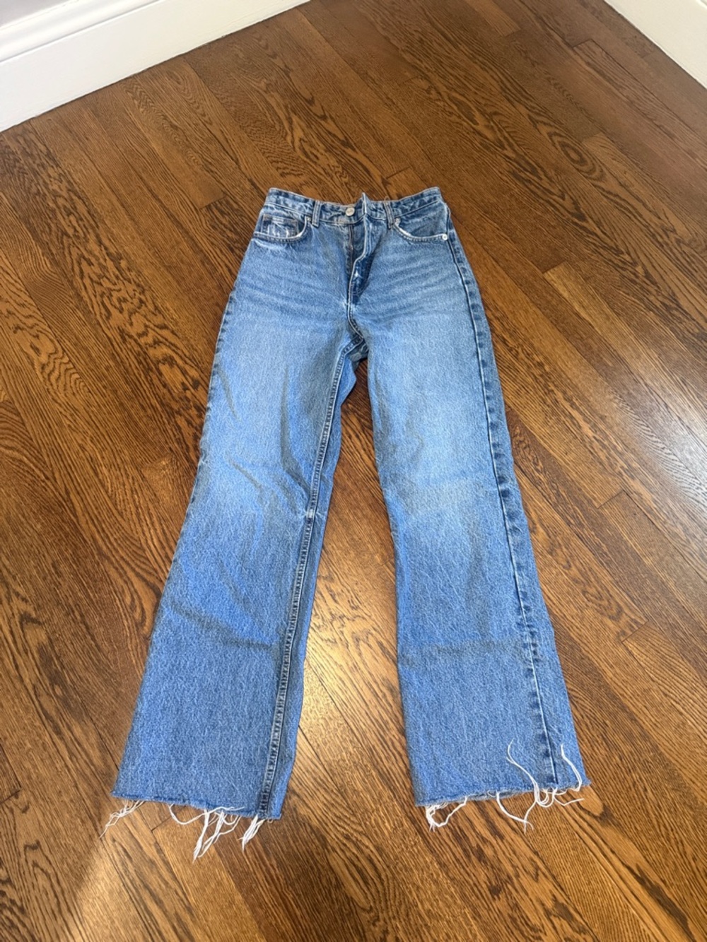 Zara Light Blue Flare Jeans with Raw Hem